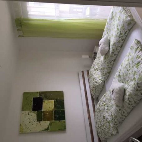 Schlafzimmer 1 mit direktem Balkonzugang., © im-web.de/ Tourist-Information Rottach-Egern