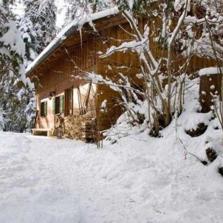Ferienhaus am Tegernsee: Das Almhaus Webermohof im Winter, &copy; im-web.de/ Tourist-Information Rottach-Egern